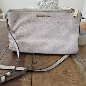 Michael Kors light pink crossbody bag